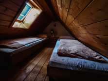 Schlafzimmer 2 Ebene 2 Kinderzimmer im Dachgiebel Zugang über Leiter